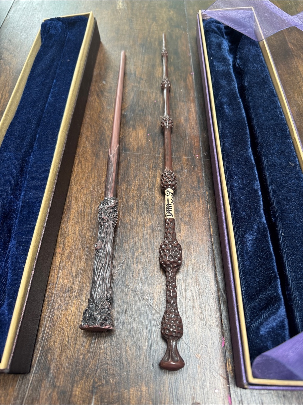 Two Harry Potter replica wands (Harry Potter and Albus Dumbledore)